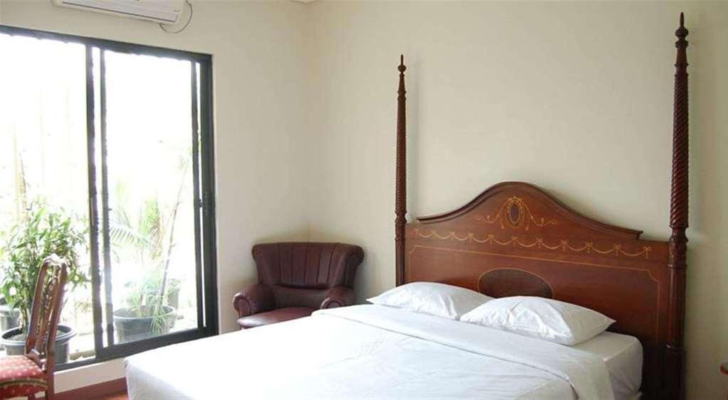 Arimbi Pejaten Suites Джакарта Номер фото